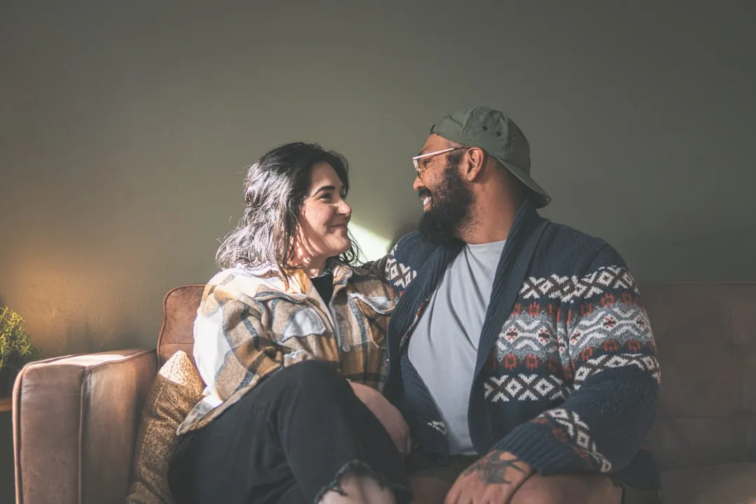 a man and a woman sitting on a couch