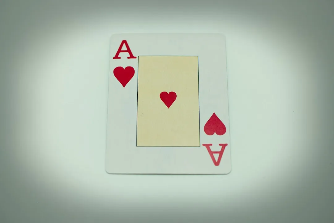 a playing card with hearts on it