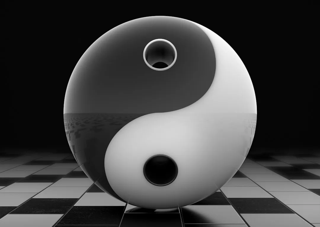 A 3D yin and yang symbol.