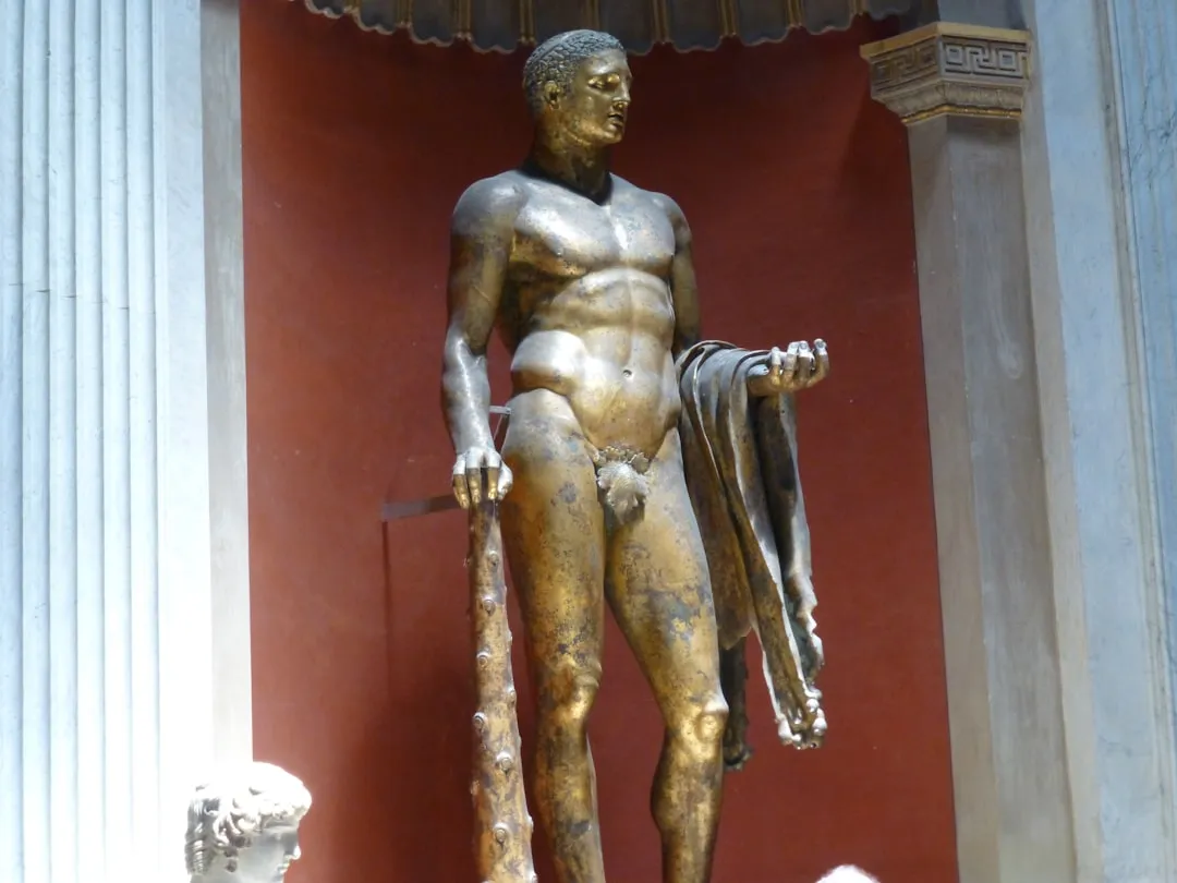 a statue of a person holding a sword