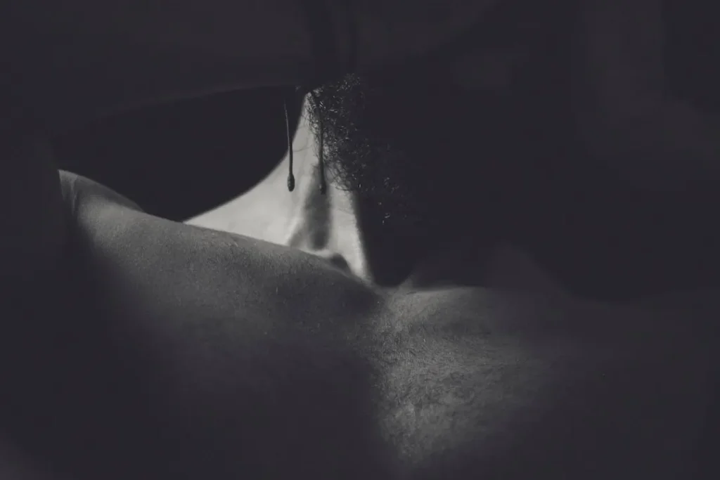 topless woman in black brassiere