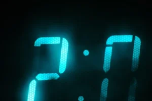 Close-up of a digital clock displaying 7:00.