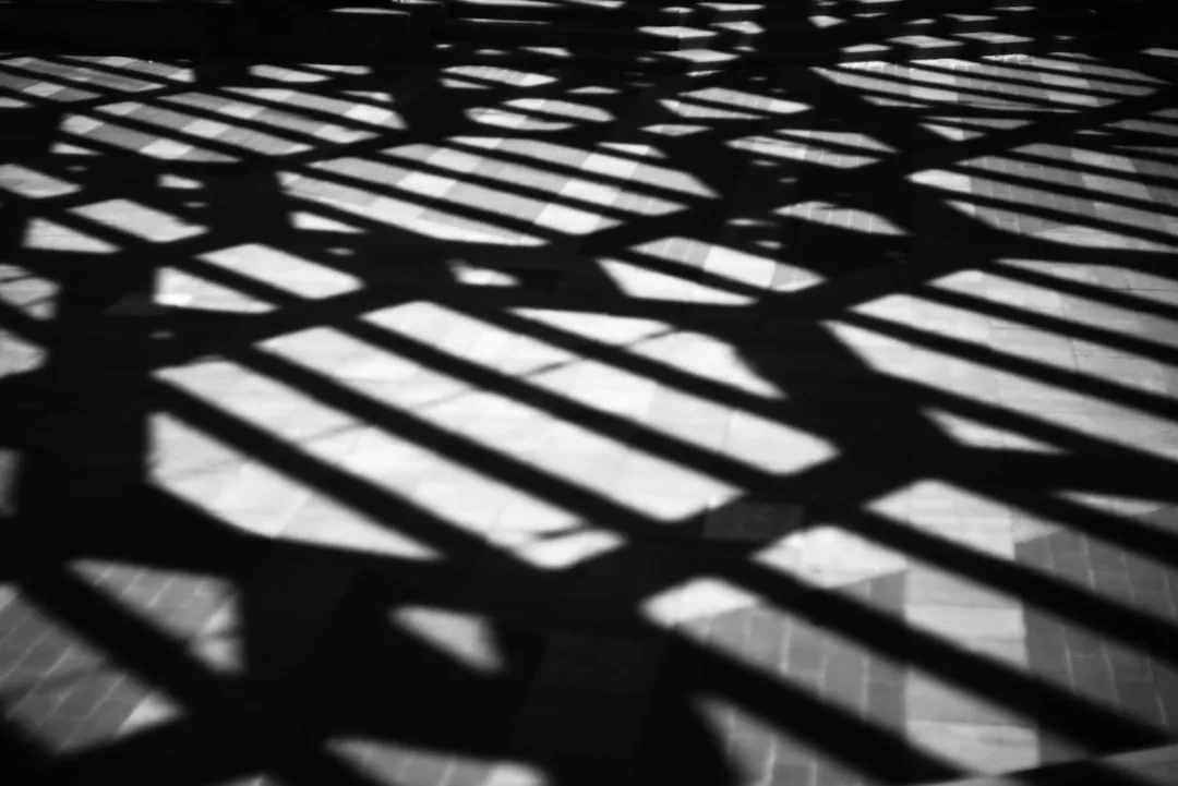 Shadows cast stripes of light and dark.