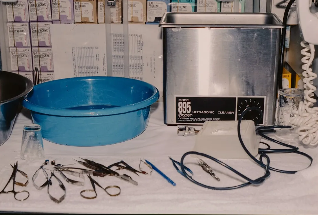 Surgical instruments and cleaning equipment on a table.