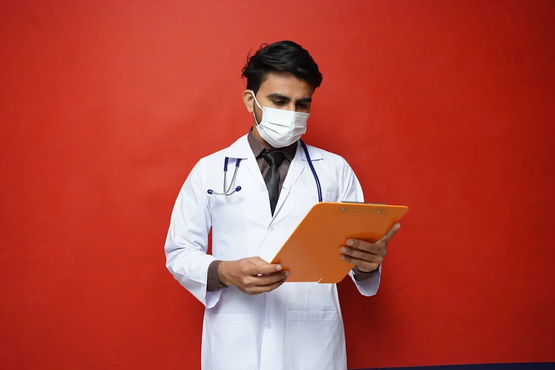 a doctor holding a tablet