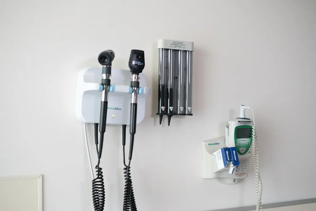 Medical diagnostic tools mounted on a wall.