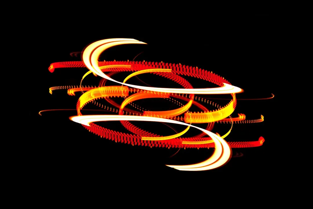 a black background with red and yellow swirls