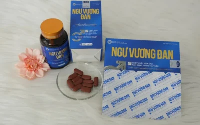 a table topped with a bottle of vitamins and pills