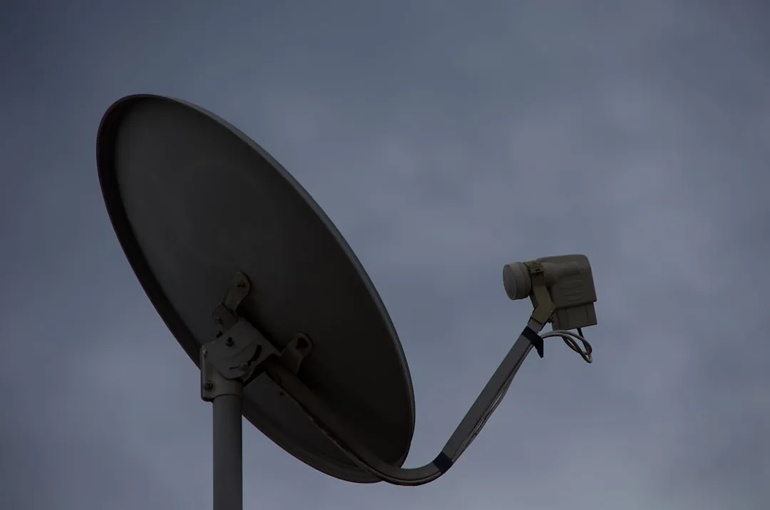 a satellite dish with a camera attached to it