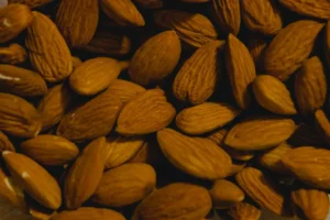 a pile of almonds sitting on top of a table