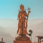 woman standing statue during daytime