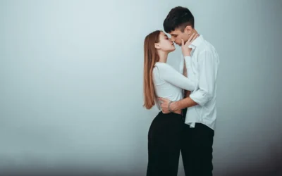 a man and woman kissing