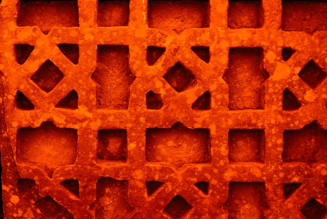 Intricate geometric pattern carved into stone