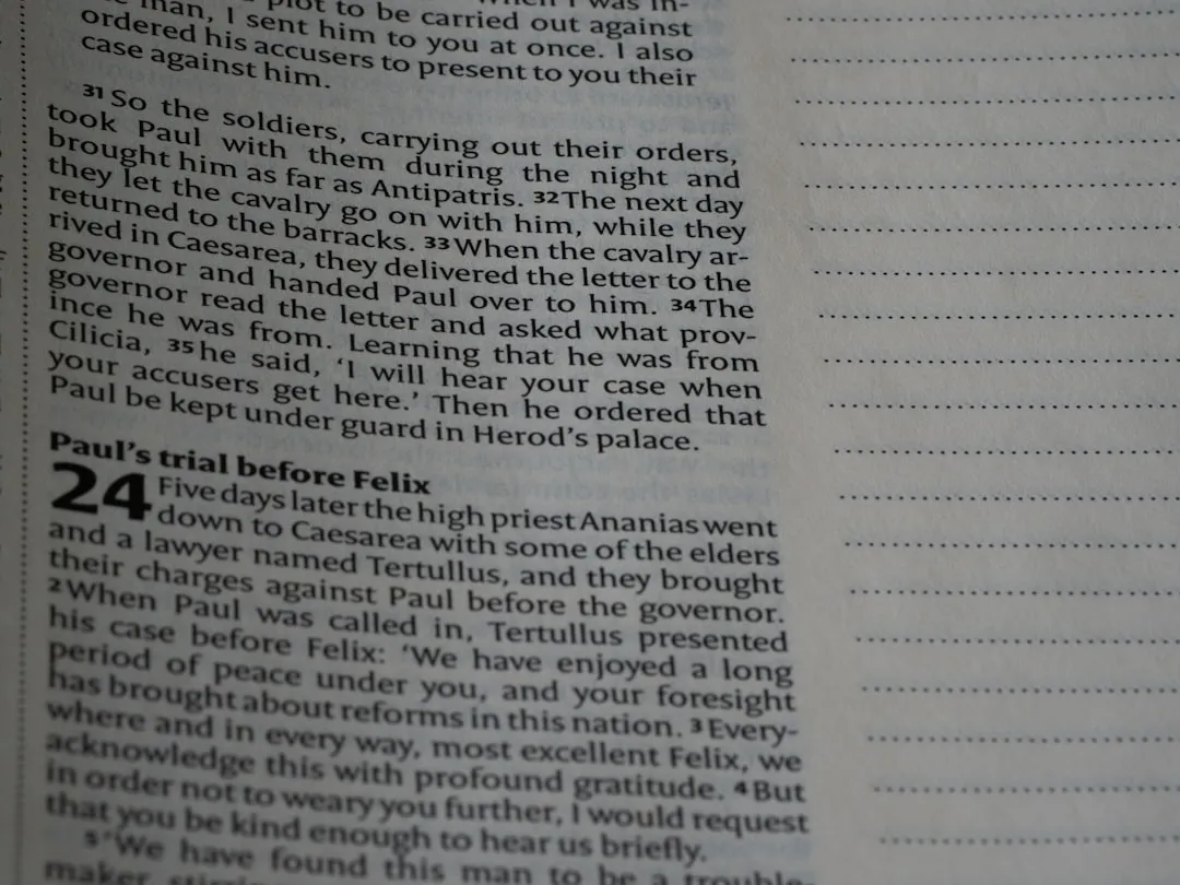 A close up of an open book with text