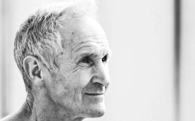 a black and white photo of an older man