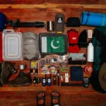 assorted items on brown wooden table