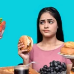 a woman eating a bowl of fruit