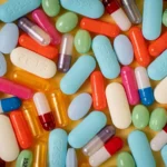 a pile of colored pills