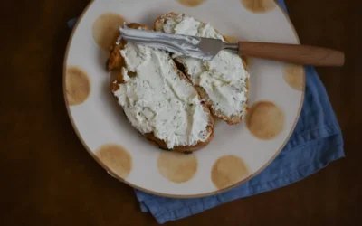 bread with white creme on plate