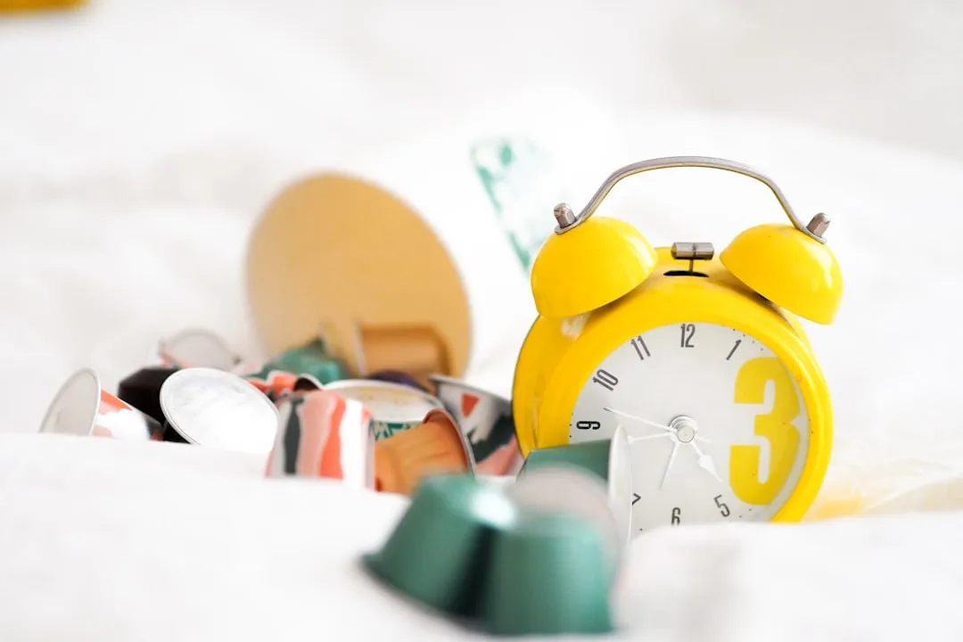 yellow alarm clock at 10 00