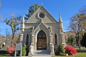 Gothic mausoleum with ornate doors and windows